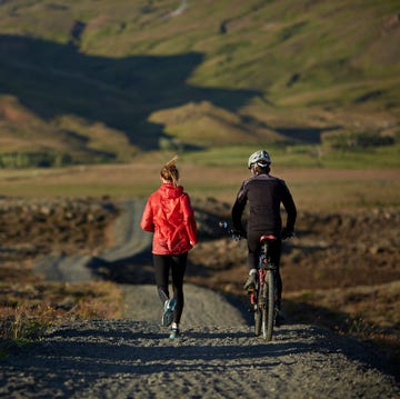 Couple running and biking together couple running and biking together