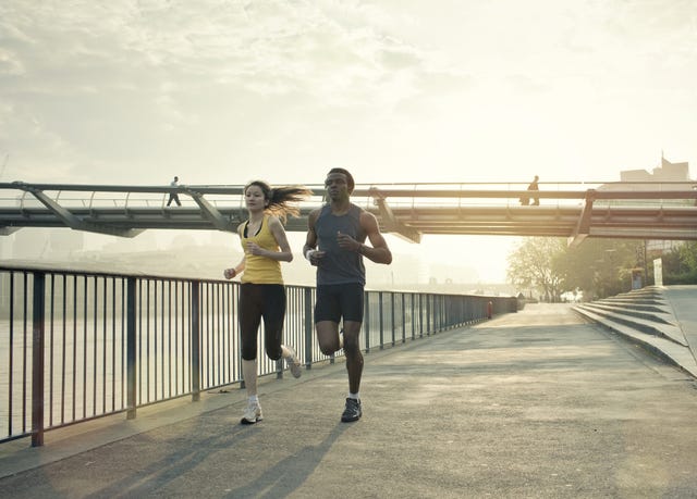 couple running in london