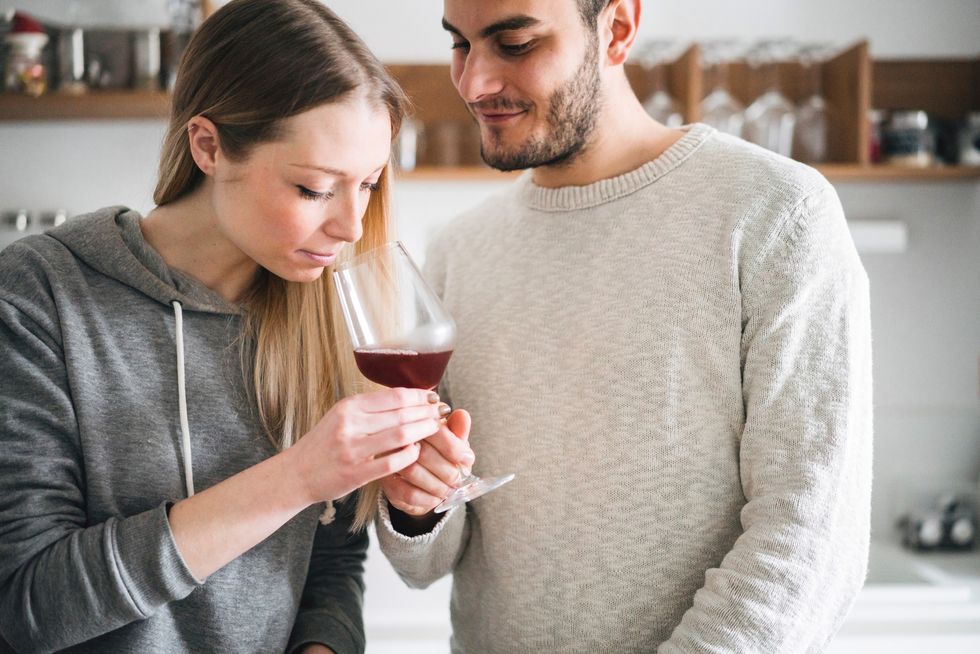 couple tasting wine