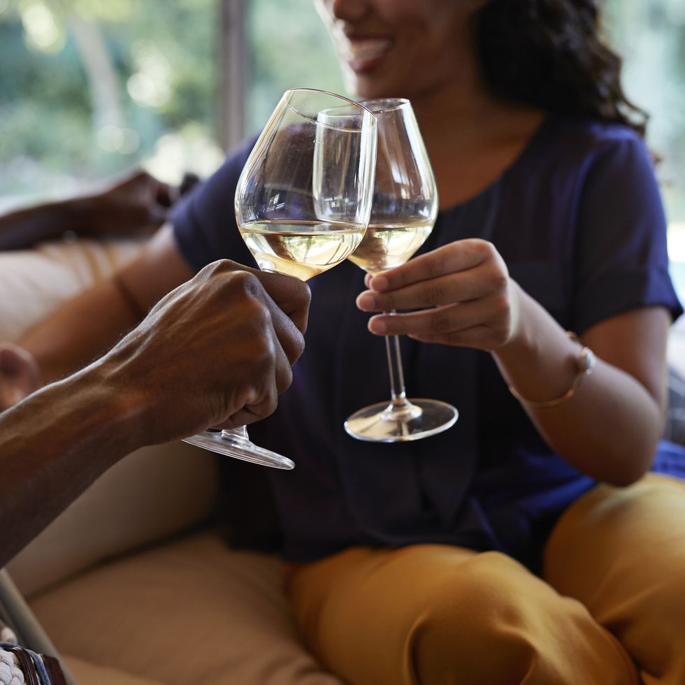couple toasting in wine