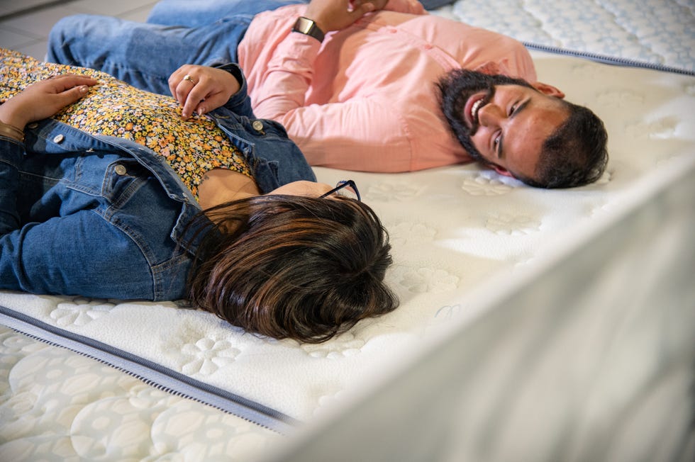 couple trying out a mattress