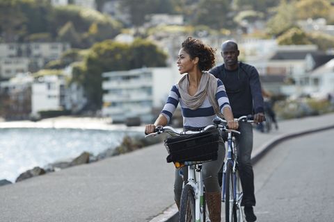 couple using rental bikes in the small town sausalito