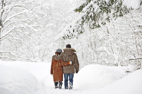 couple walking in snow things to do on valentines day