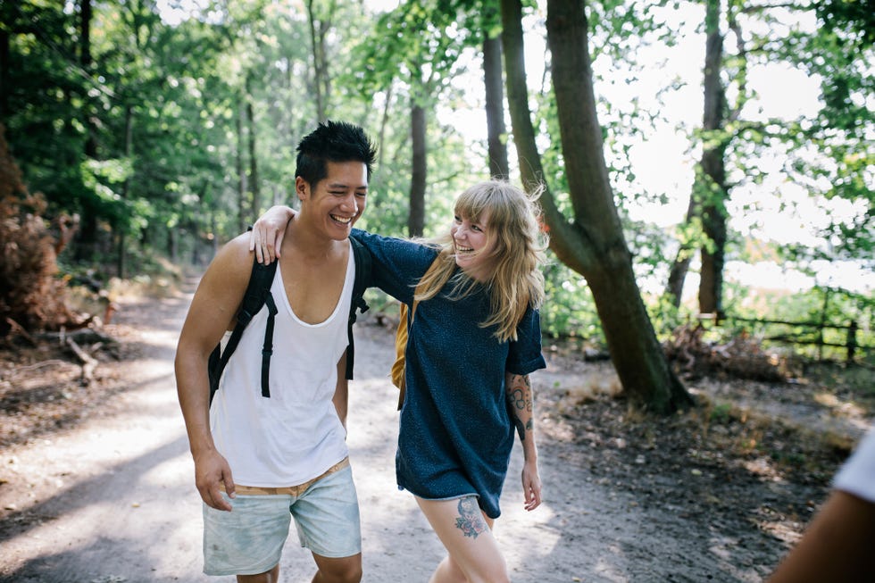 couple walking together in afternoon sun