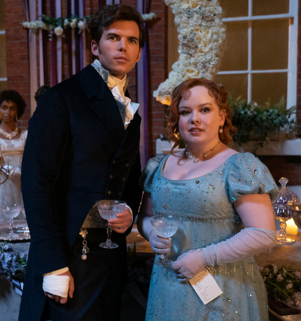 luke newton as colin bridgerton and nicola coughlan as penelope featherington in a still shot from season 3 of 'bridgerton'