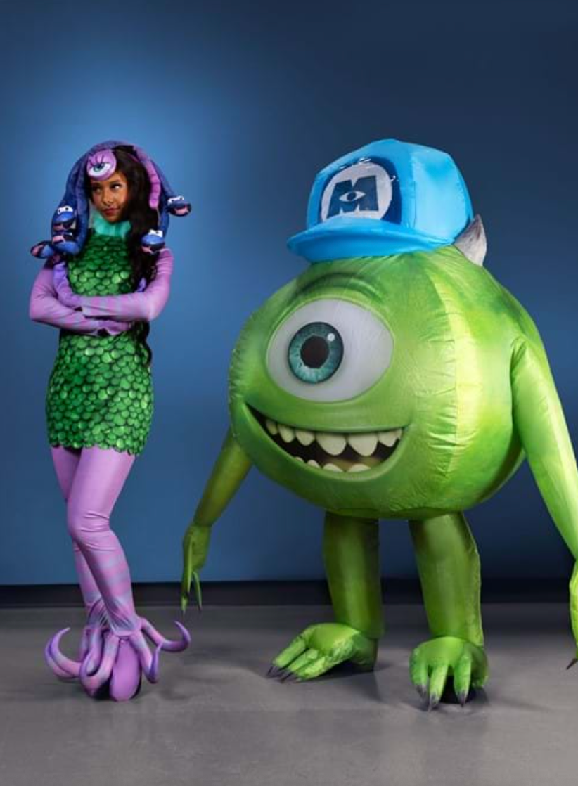 woman dressed in monsters inc celia costume and a man dressed as mike wazowski
