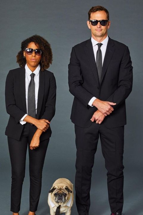 couples halloween costumes girlfriend and boyfriend dressed up in men in black costumes