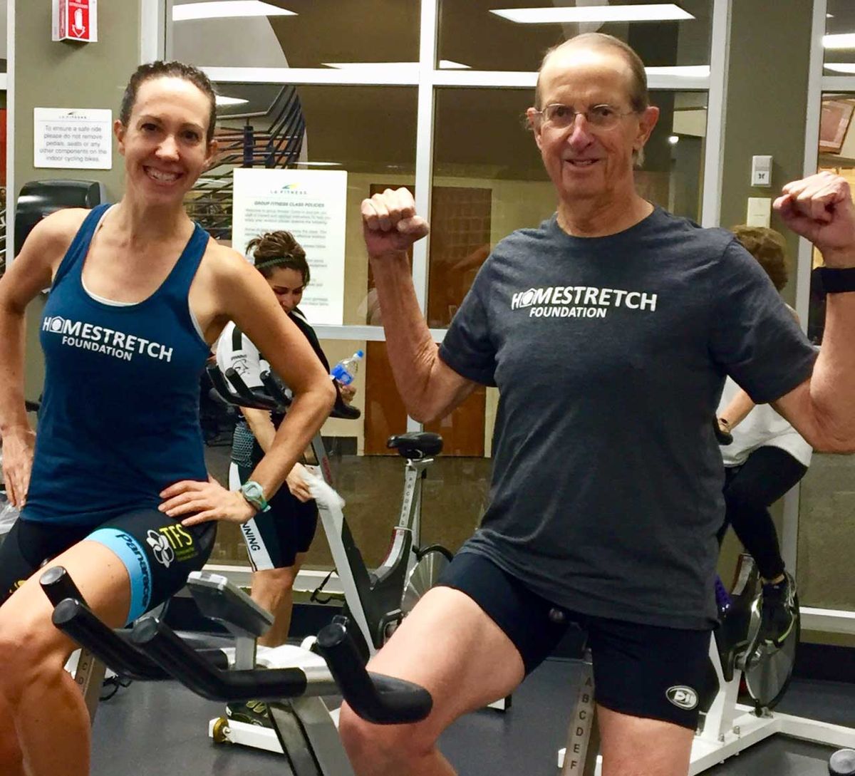 kathryn bertine and her dad at a spin class