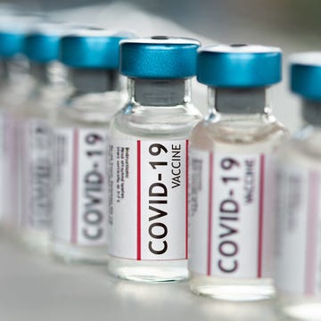 Covid-19 Coronavirus Vaccine vials in a row macro close up covid 19 coronavirus vaccine vials in a row macro close up