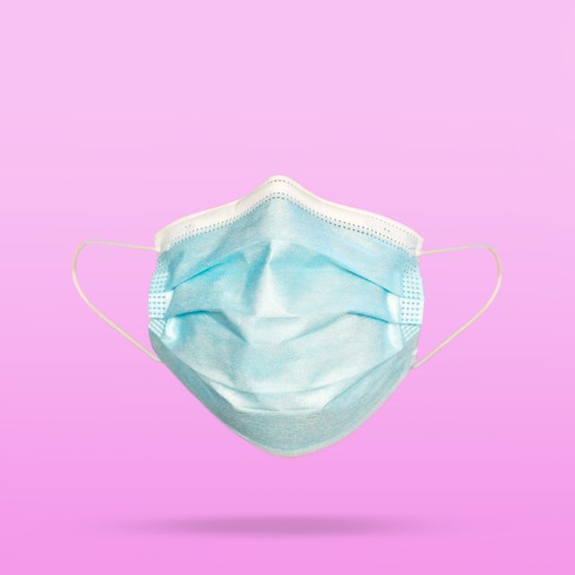 what is flurona, covid19 face mask on color background