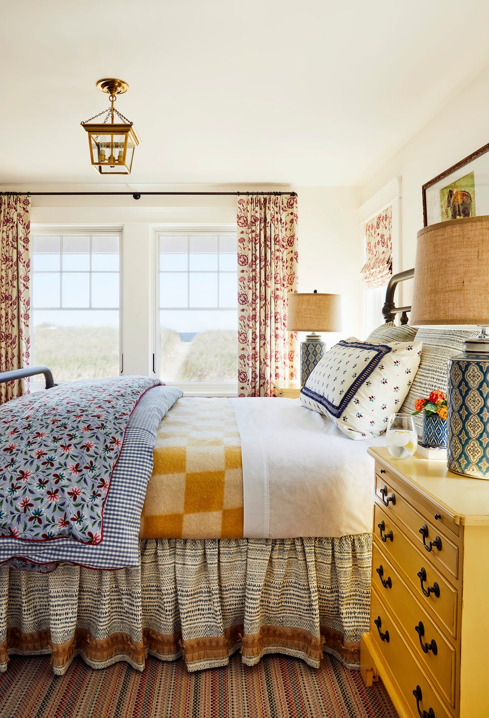 new england home by designer katie rosenfeld bedroom with yellow accents