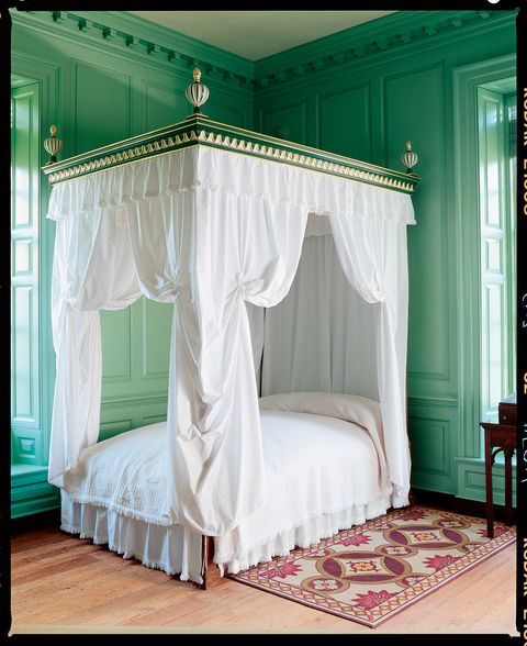 canopy bed in green room