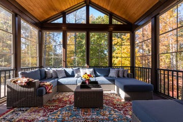 fall porch ideas cozy furnished porch enclosure in autumn season with wicker furniture and colorful distressed area rug
