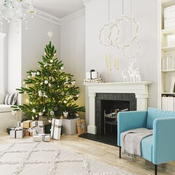 cozy living room with fireplace and christmas decoration
