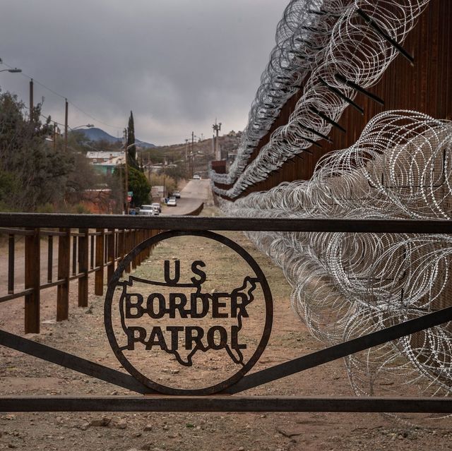 topshot   a metal fence marked with the us border patrol sign prevents people to get close to the barbedconcertina wire covering the usmexico border fence, in nogales, arizona, on february 9, 2019 photo by ariana drehsler  afp        photo credit should read ariana drehslerafp via getty images