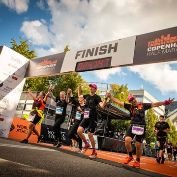 copenhagen half marathon crossing finish line copenhagen half marathon crossing finish line