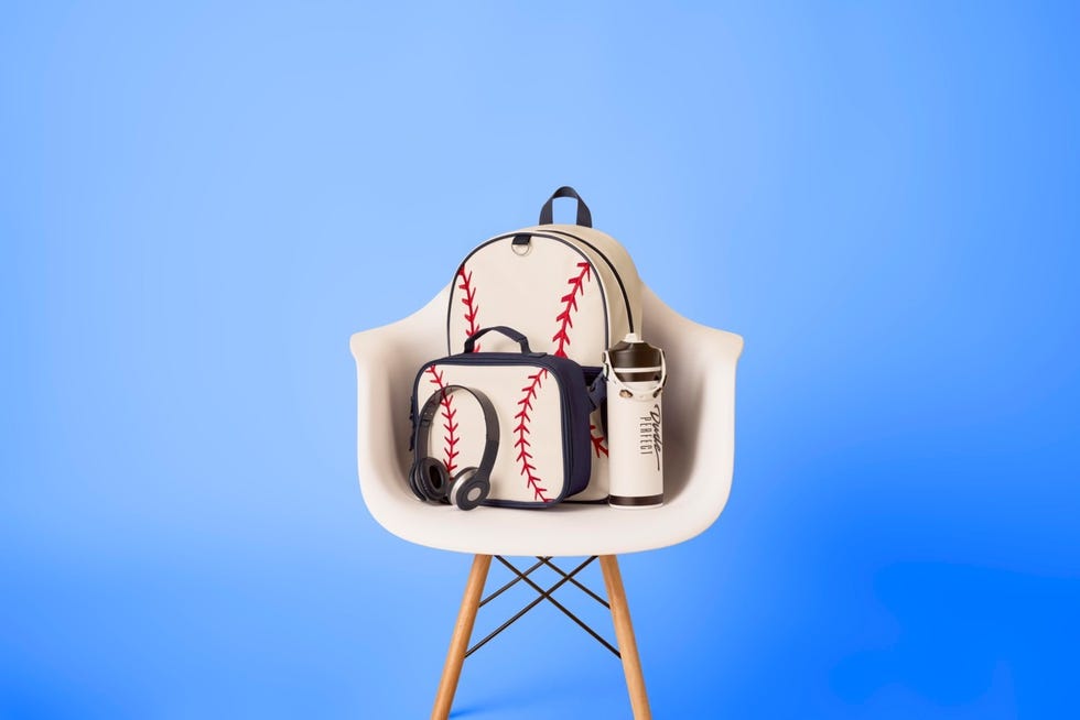 a collection of baseballthemed accessories arranged on a chair