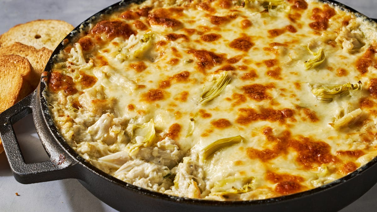 Video player poster image preview for This Cheesy Crab Artichoke Dip Is Ultra Decadent