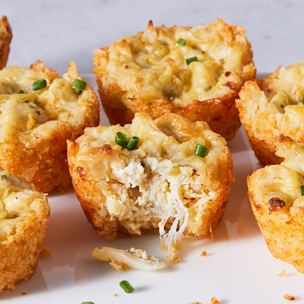 crab cake bites dipped in a sour cream and chive dipping sauce