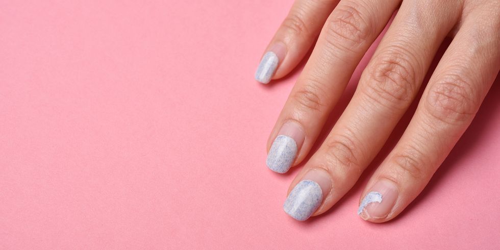 cracked broken nail, nail weakness damage from gel polish coating, fingernail manicure hygiene