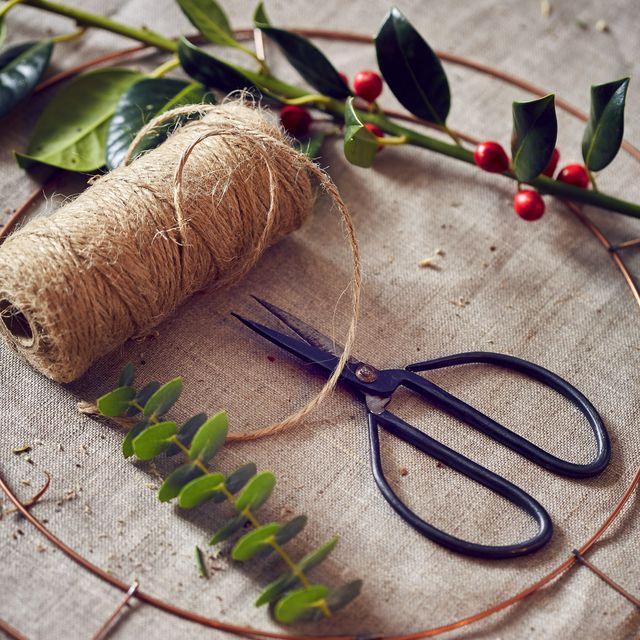 to brighten dark days, florist sarah williamson weaves rustic wreaths in her wiltshire farmhouse, inviting others to learn the skill at winter workshops pod pipstems, berries and winter flowers are selected from the bucketfuls sarah collects, then trimmed, tied together and bound into a moss base on a copper frame