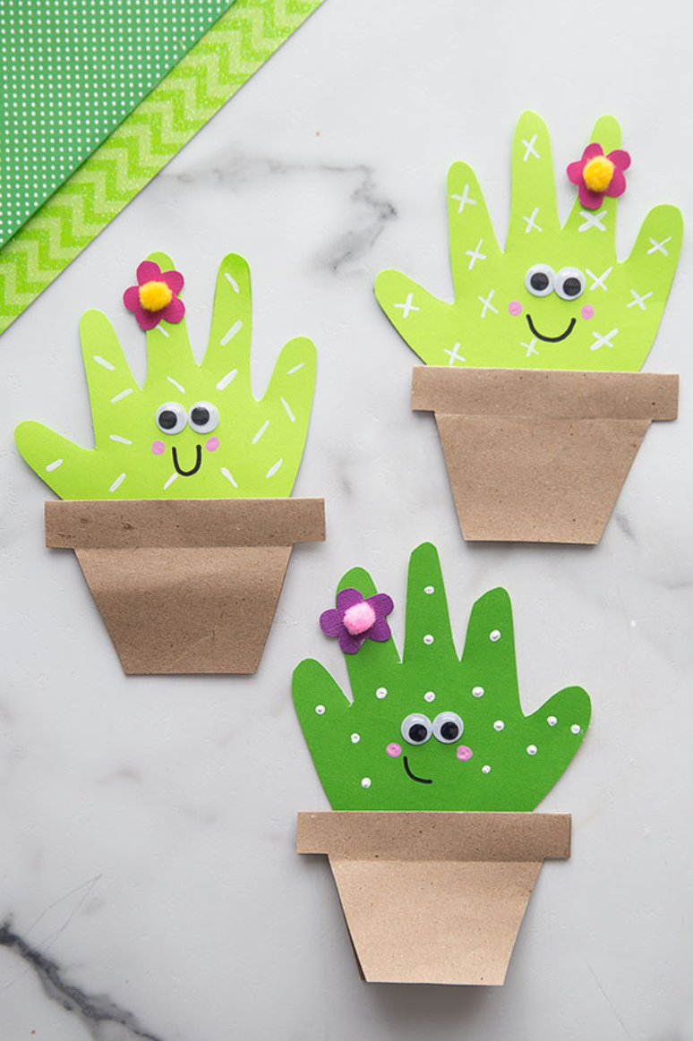 crafts for kids, paper cacti with googly eyes and drawn on smiley faces