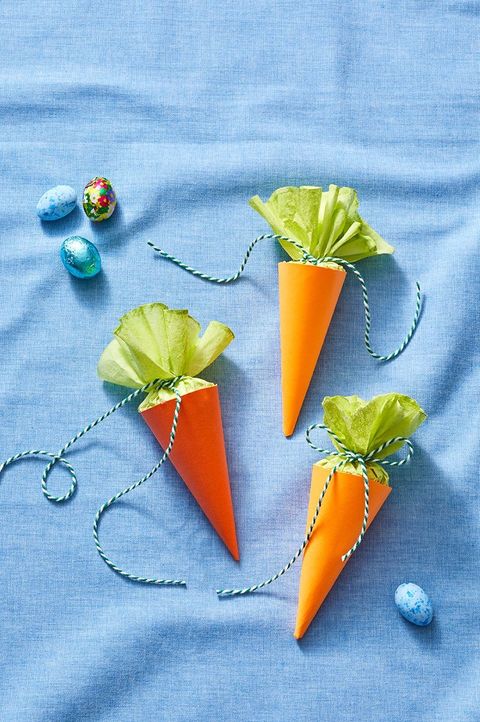 crafts for kids carrot treat cones with green tissue paper inside