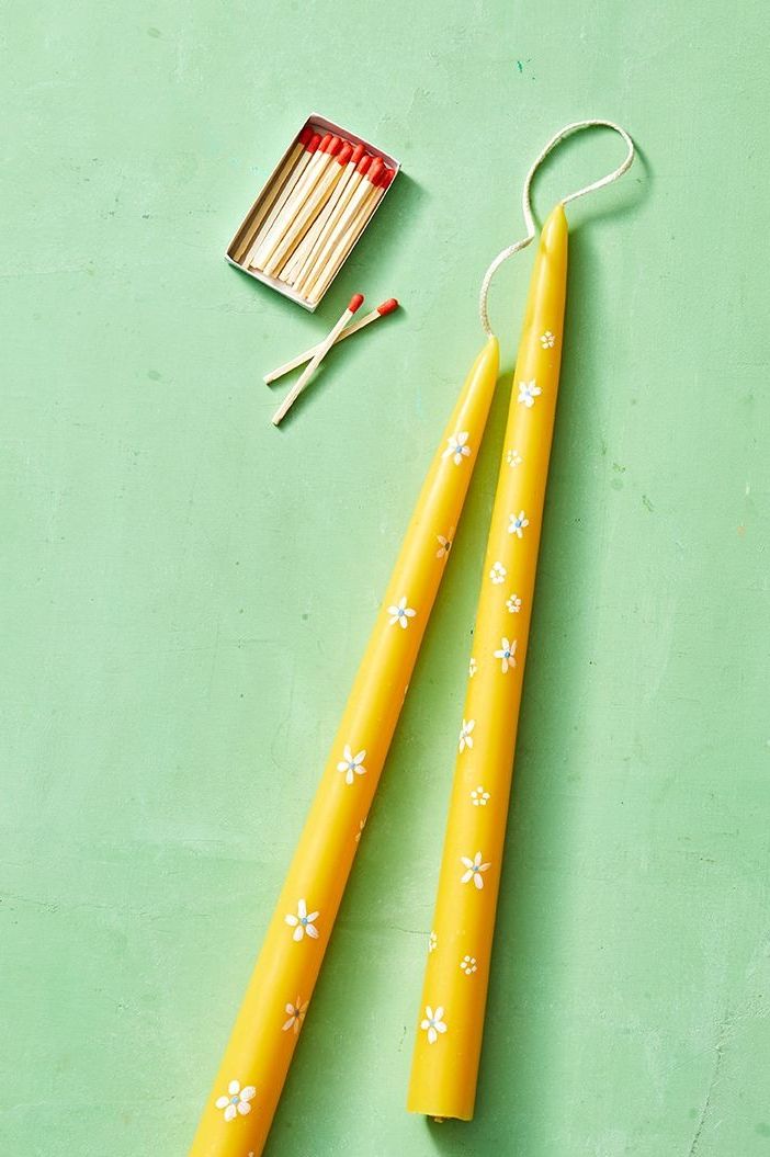 crafts for kids yellow taper candles with white floral designs