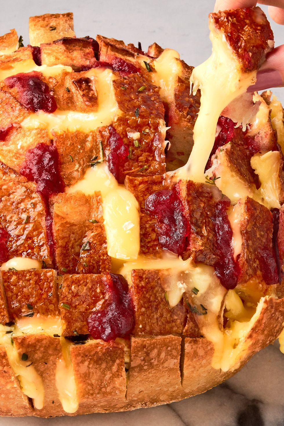 pull apart bread with cheese and cranberry sauce