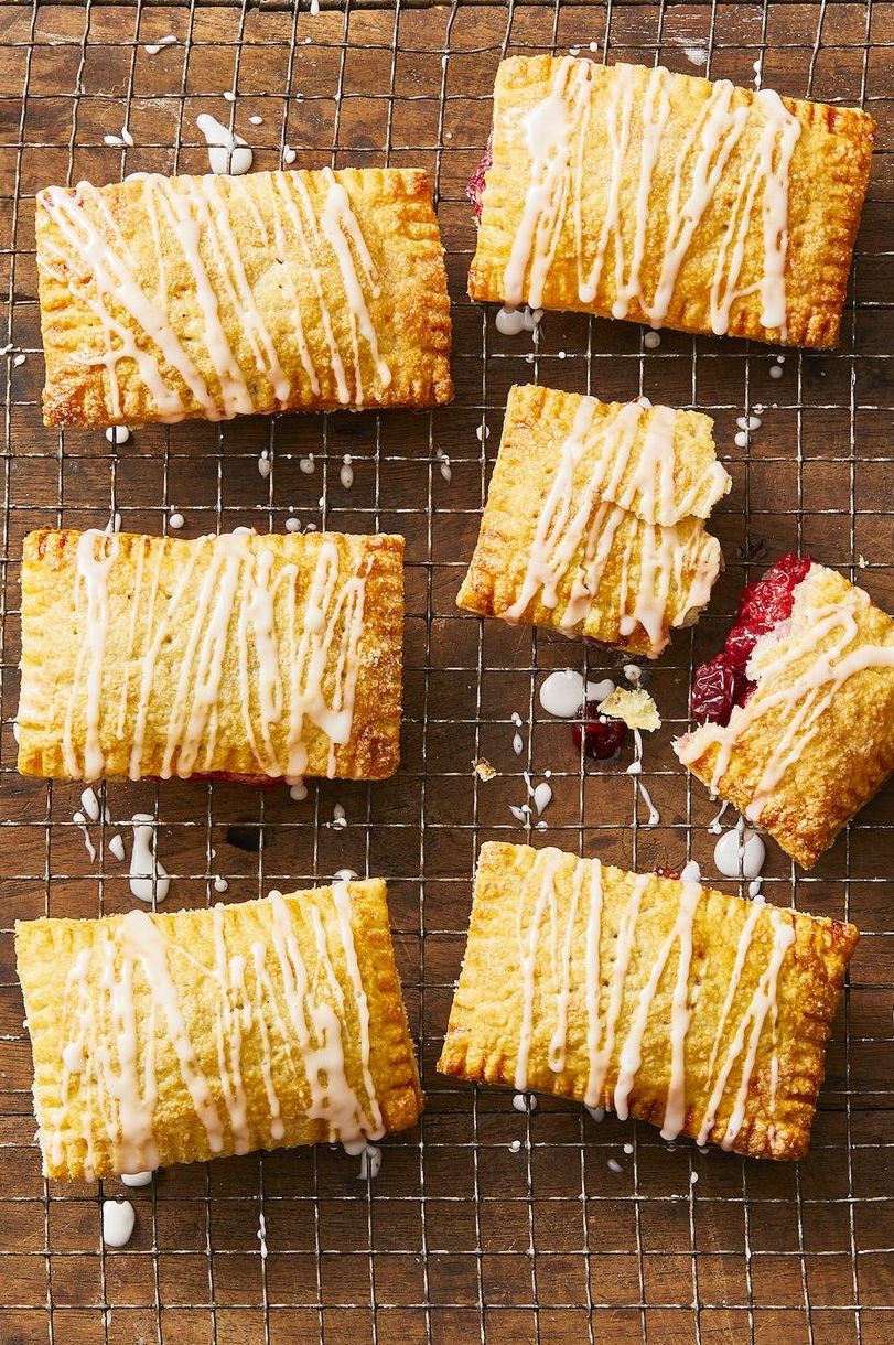 cranberry hand pies with icing drizzled on top