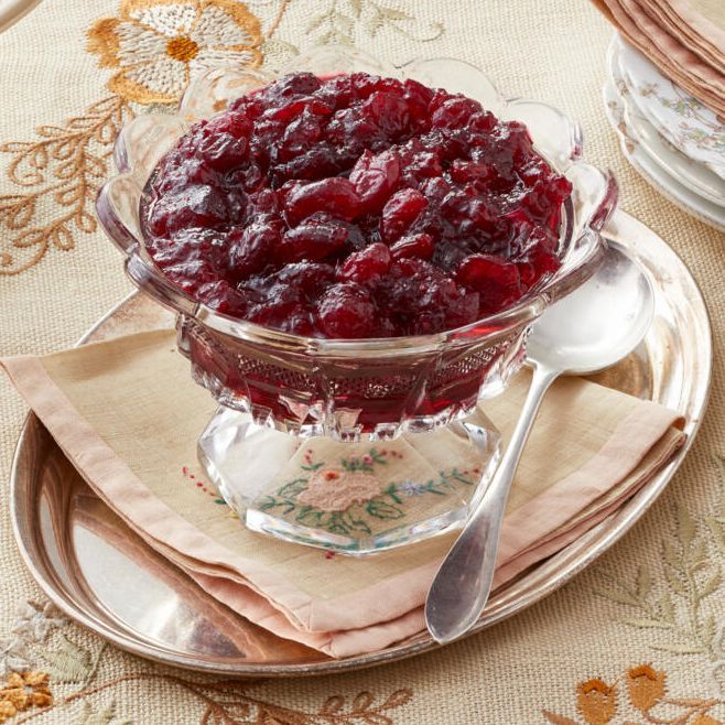 instant pot cranberry sauce in glass dish with spoon