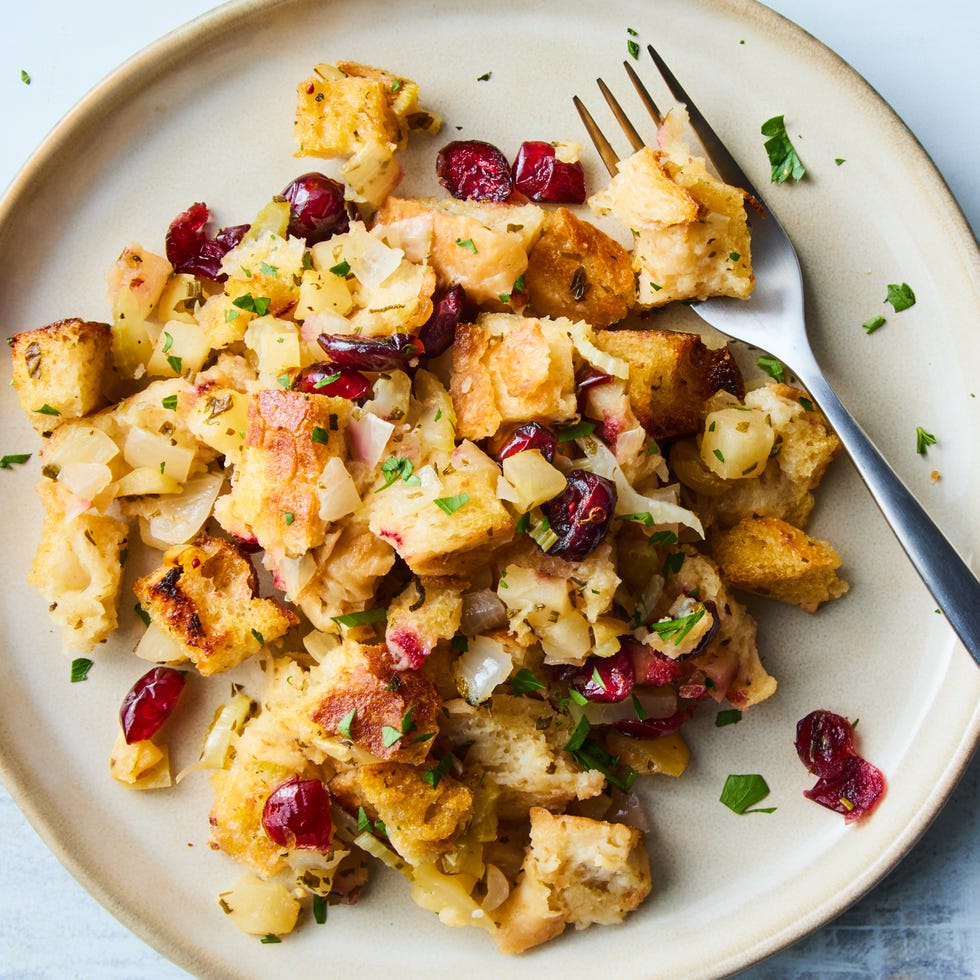stuffing in a casserole dish with cranberries