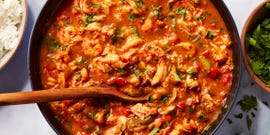 crawfish étouffée served with white rice and parsley
