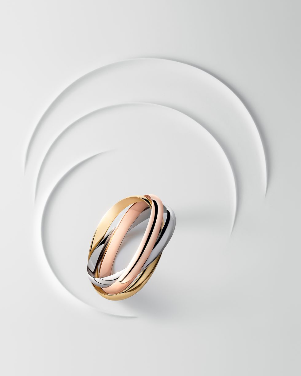 a ring on a white plate