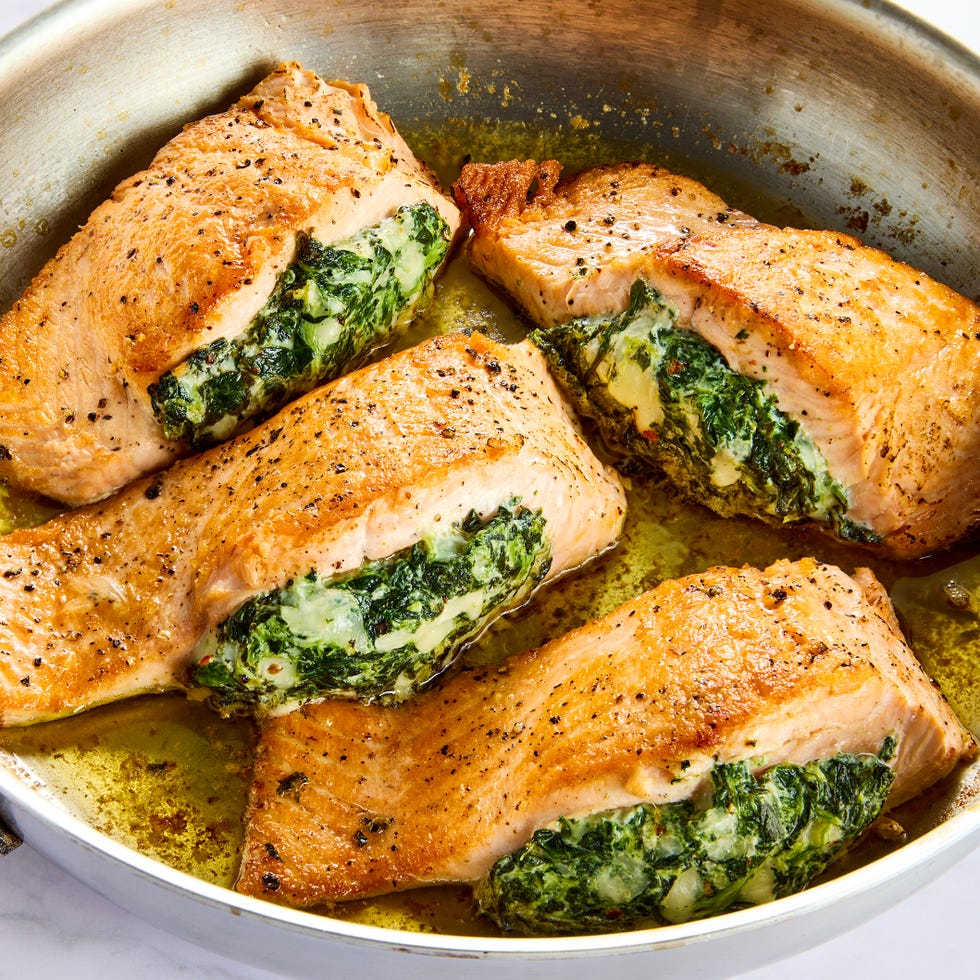 salmon stuffed with creamed spinach with lemons