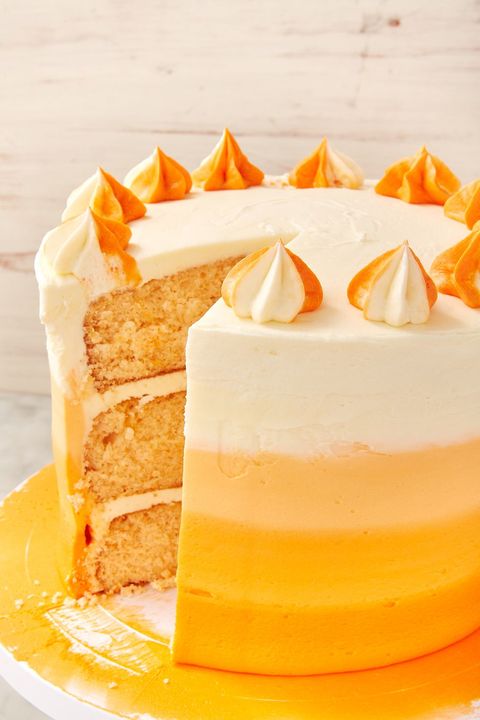 orange ombre cake with a slice taken out