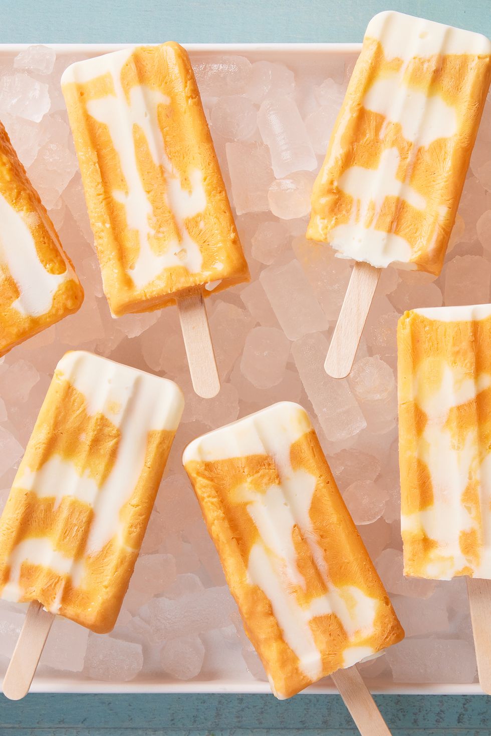 frozen creamsicle bars with orange and cream swirls