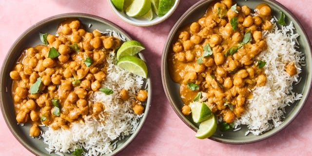 chickpeas in a creamy coconut lime sauce in a skillet
