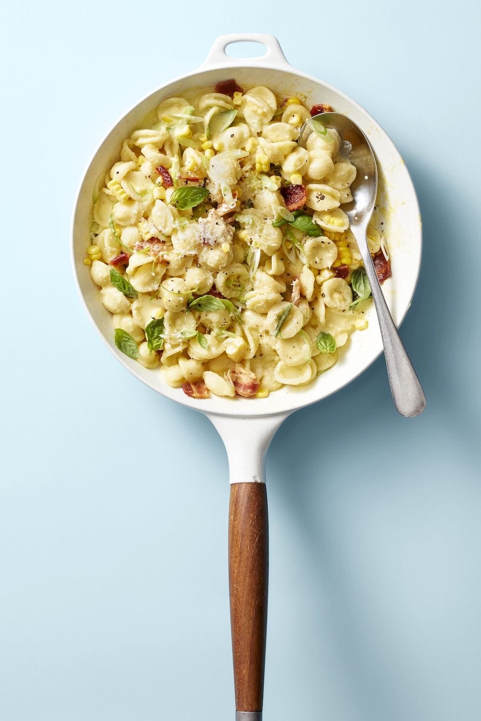 creamy corn pasta with bacon and scallions
