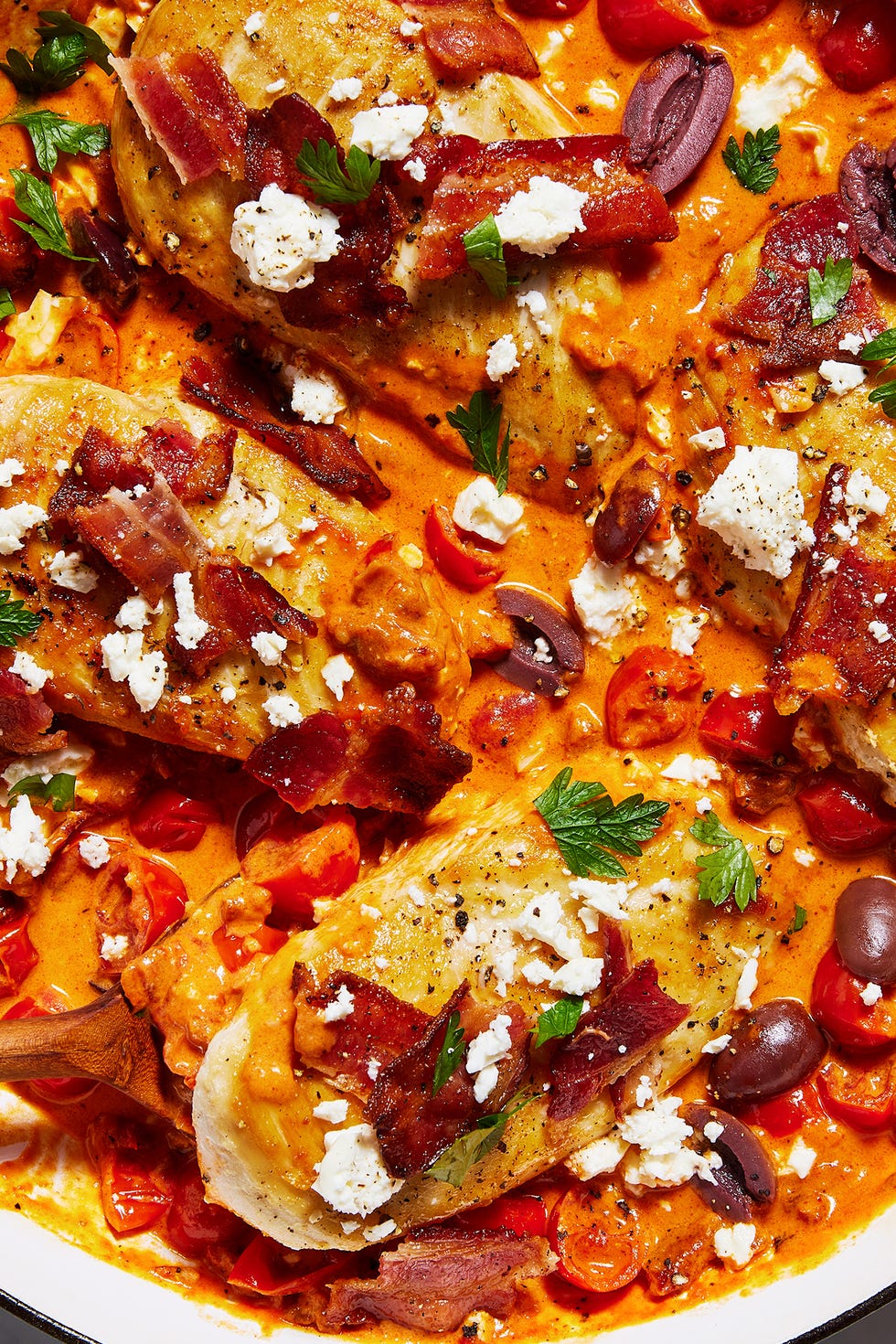 Creamy Feta and Tomato Chicken Chicken breasts in a creamy sauce with tomatoes, feta cheese, bacon and olives