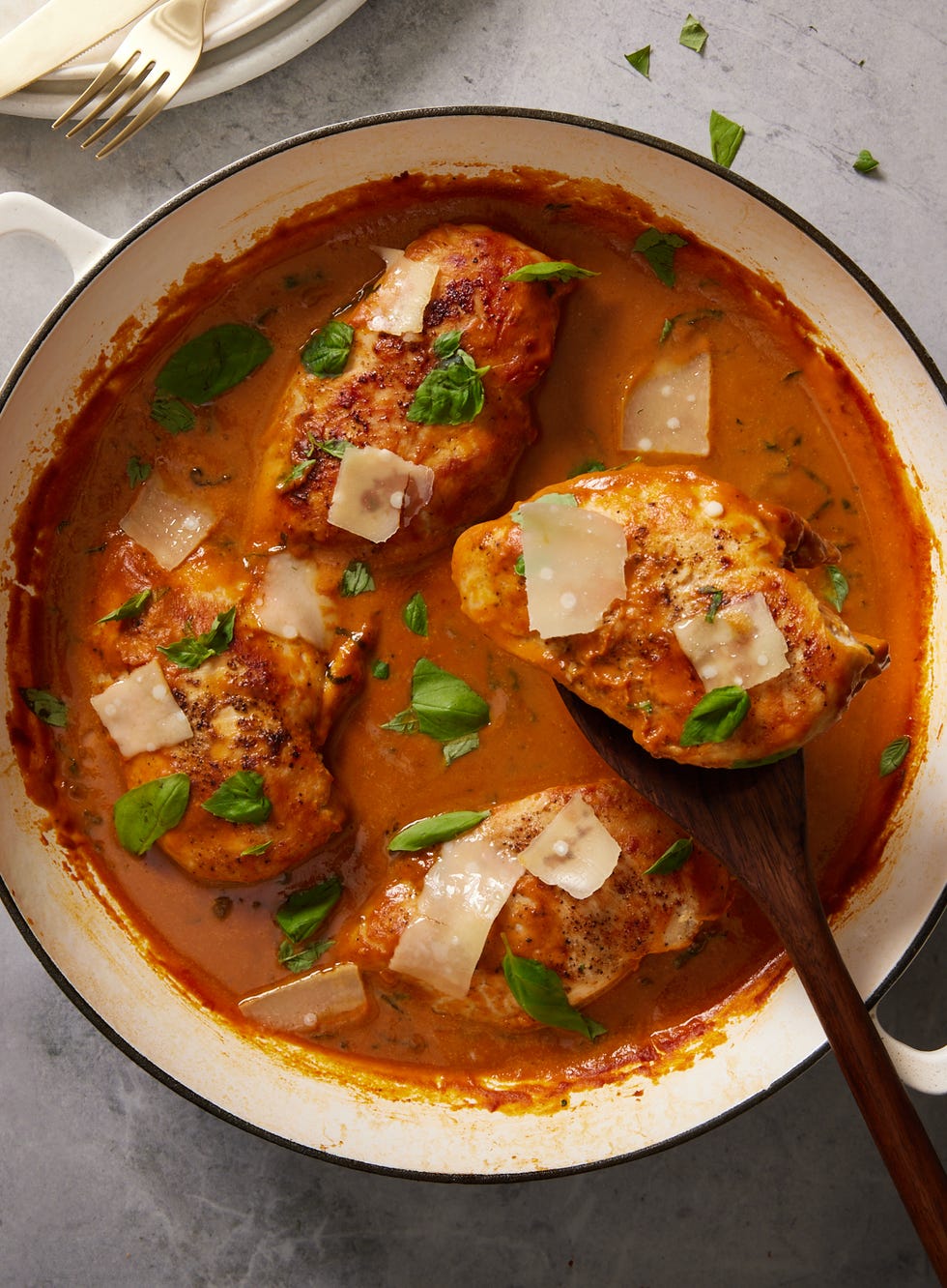 creamy pumpkin and parmesan chicken with linguine, topped with green onions