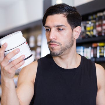 man looking at creatine