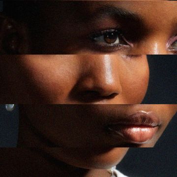 a young black womans face is distorted