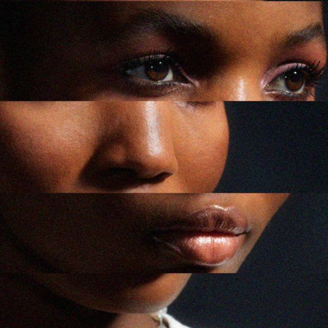 a young black womans face is distorted