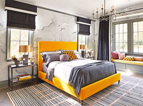 Bed, Lighting, Room, Interior design, Yellow, Floor, Bedding, Property, Bedroom, Bed sheet, 