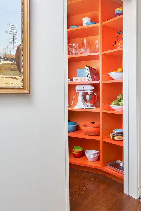 orange shelves in pantry