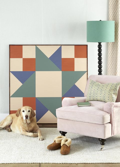 room with oversize quilt square painted on plywood wall art, diy