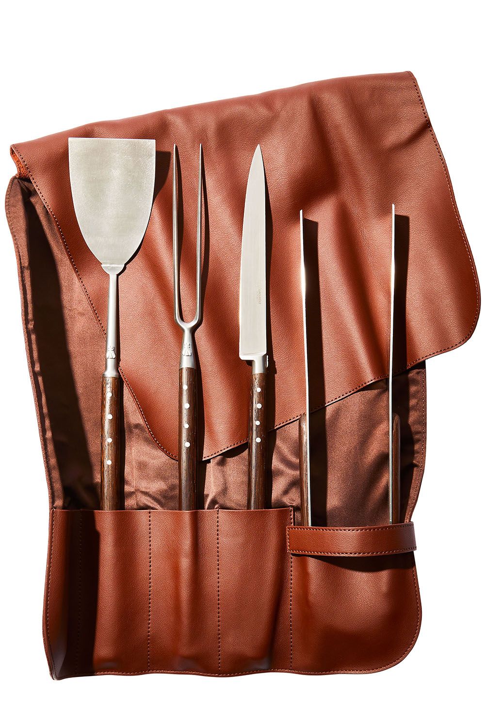 Brown, Leather, Tan, Outerwear, Tool, Personal protective equipment, Peach, Cosmetics, Metal, 