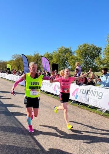 runners participating in a race event with spectators cheering