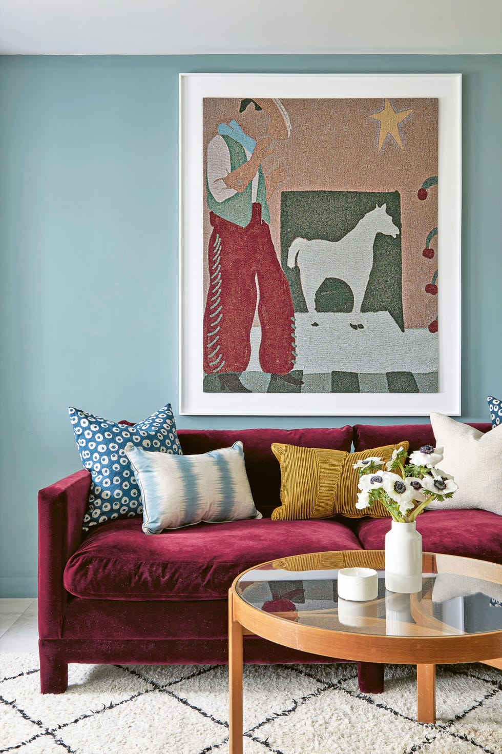 blue room with artwork
